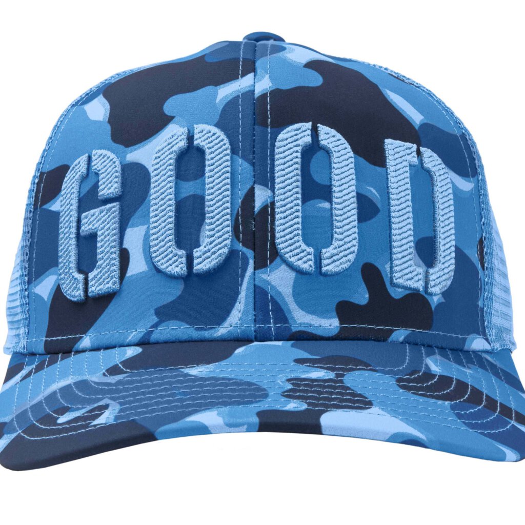 Camouflage cap with GOOD across front panel