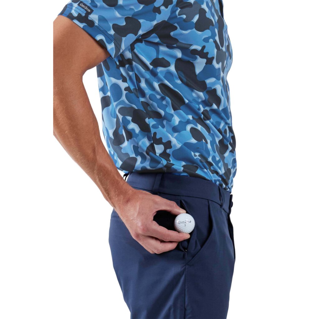 Man holding golf ball near his pocket